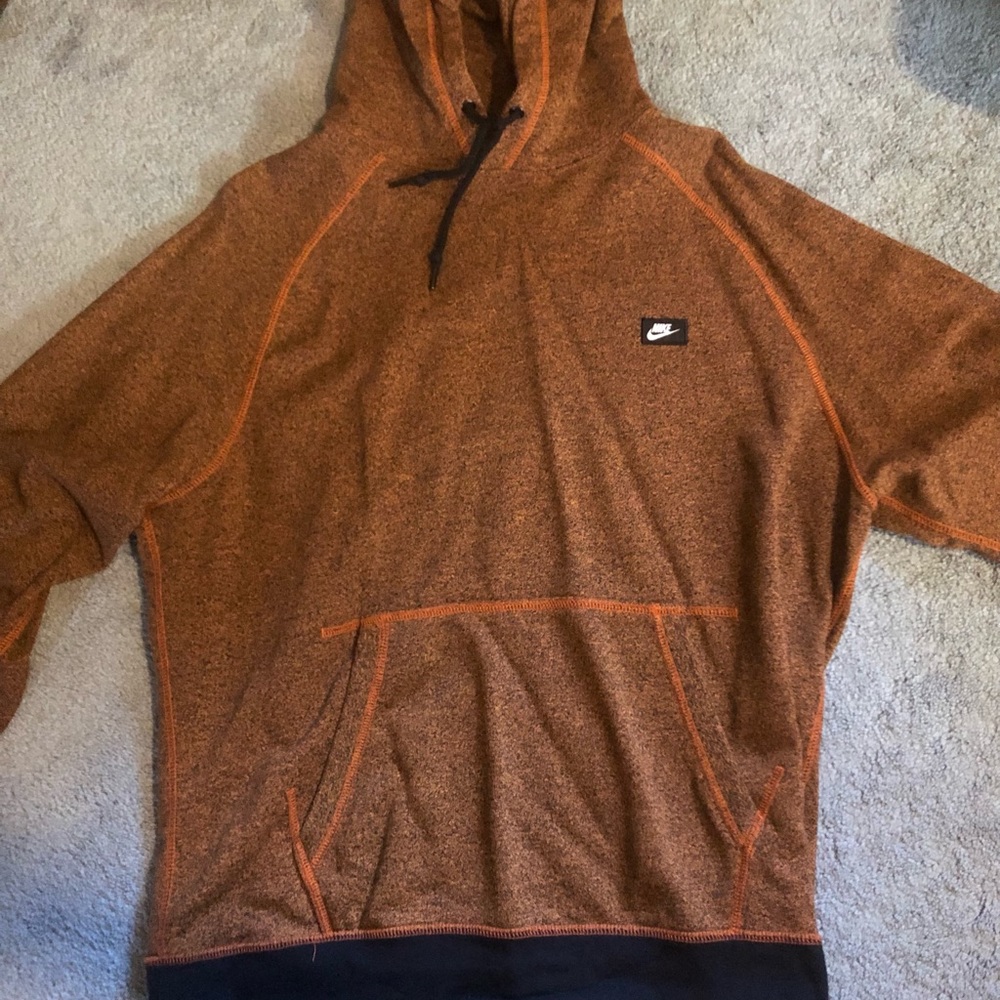 Nike orange hoodie with black stitching